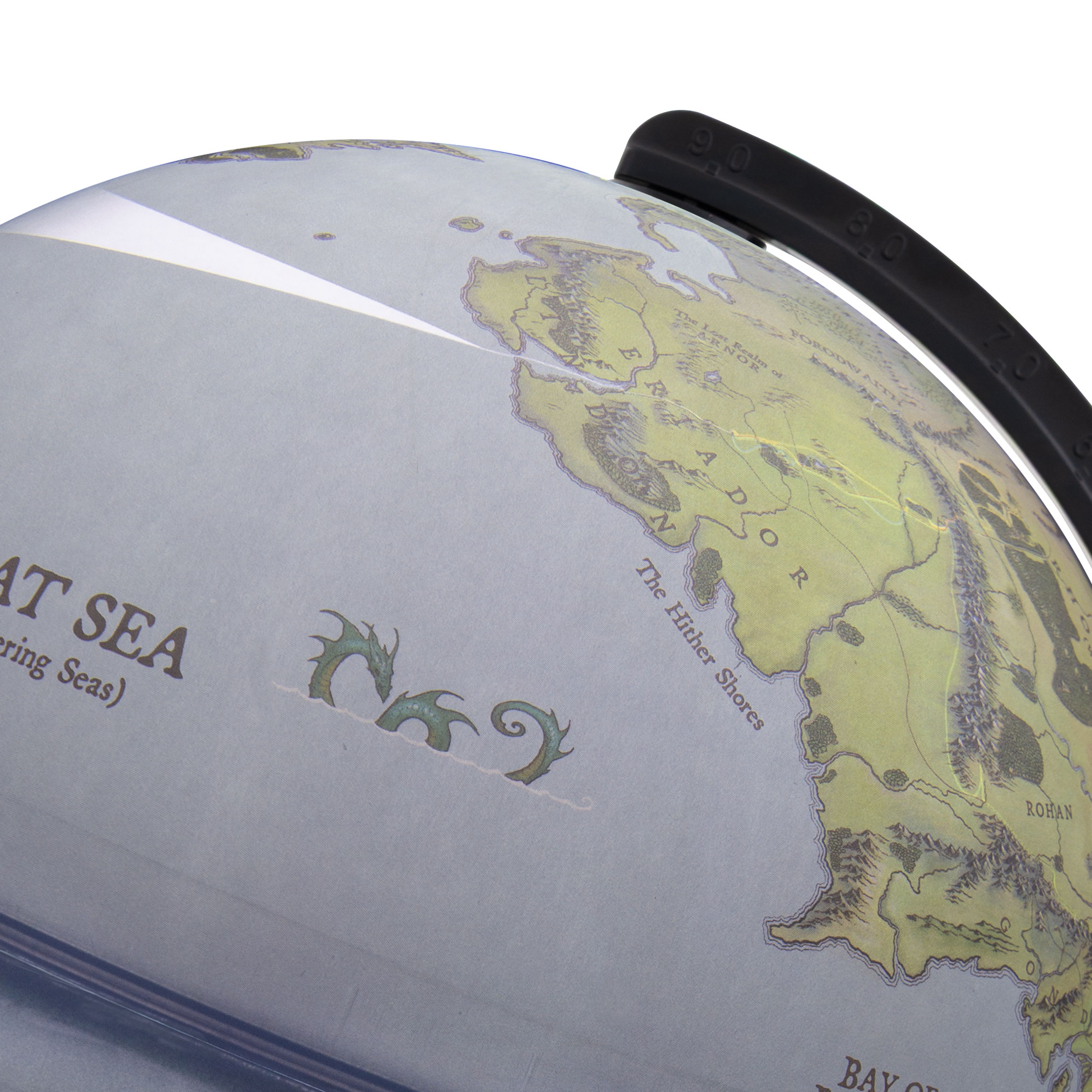 Close-up of an illuminated Middle-earth globe from Tolkien’s “The Lord of the Rings,” focusing on the Great Sea, Eriador, and the Bay of Belfalas. Lighting enhances contours and colors.